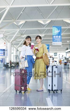 Japanese women at the airport View Large Photo Image Picture - Japanese women at the airport. Fotosearch