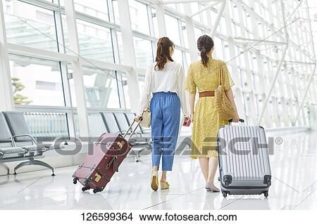 Japanese women at the airport View Large Photo Image Picture - Japanese women at the airport. Fotosearch