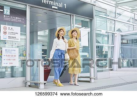 Japanese women at the airport View Large Photo Image Picture - Japanese women at the airport. Fotosearch