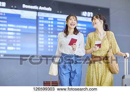 Japanese women at the airport View Large Photo Image Stock Image - Japanese women at the airport. Fotosearch