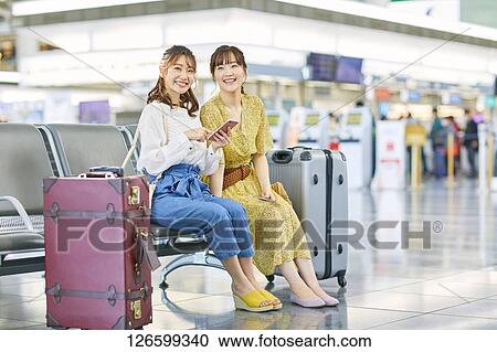 Japanese women at the airport View Large Photo Image Stock Image - Japanese women at the airport. Fotosearch