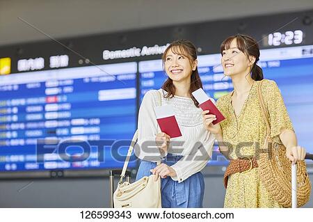 Japanese women at the airport View Large Photo Image Stock Image - Japanese women at the airport. Fotosearch