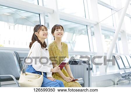 Japanese women at the airport View Large Photo Image Stock Image - Japanese women at the airport. Fotosearch