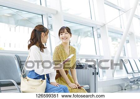 Japanese women at the airport View Large Photo Image Stock Image - Japanese women at the airport. Fotosearch