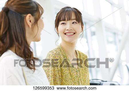 Japanese women at the airport View Large Photo Image Stock Image - Japanese women at the airport. Fotosearch