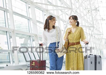 Japanese women at the airport View Large Photo Image Stock Image - Japanese women at the airport. Fotosearch