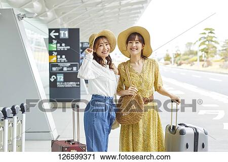 Japanese women at the airport View Large Photo Image Stock Image - Japanese women at the airport. Fotosearch