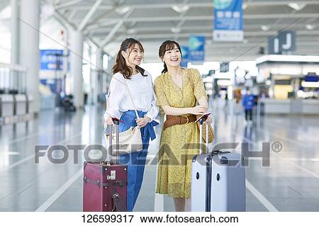 Japanese women at the airport View Large Photo Image Stock Photo - Japanese women at the airport. Fotosearch