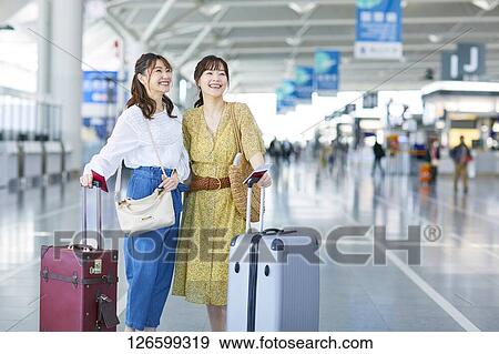 Japanese women at the airport View Large Photo Image Stock Photo - Japanese women at the airport. Fotosearch