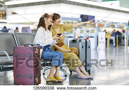 Japanese women at the airport View Large Photo Image Stock Photo - Japanese women at the airport. Fotosearch