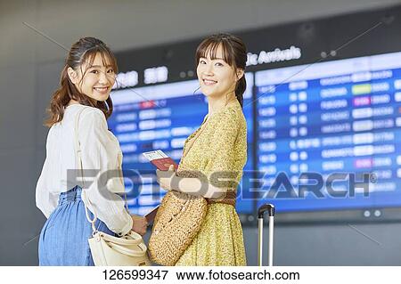 Stock Photo - Japanese women at the airport. Fotosearch