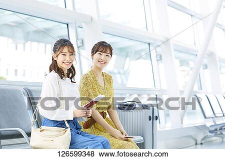 Stock Photo - Japanese women at the airport. Fotosearch