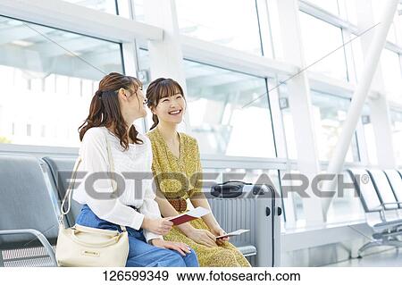 Stock Photo - Japanese women at the airport. Fotosearch