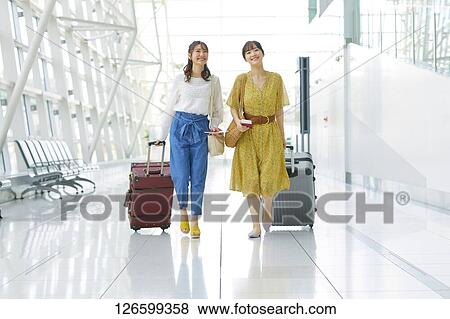 Japanese women at the airport View Large Photo Image Stock Photo - Japanese women at the airport. Fotosearch