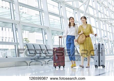 Japanese women at the airport View Large Photo Image Stock Photo - Japanese women at the airport. Fotosearch