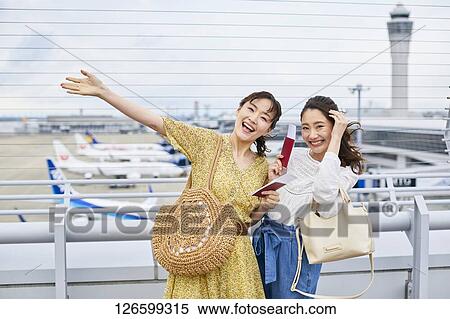 Japanese women at the airport View Large Photo Image Stock Photography - Japanese women at the airport. Fotosearch