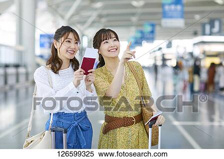 Japanese women at the airport View Large Photo Image Stock Photography - Japanese women at the airport. Fotosearch