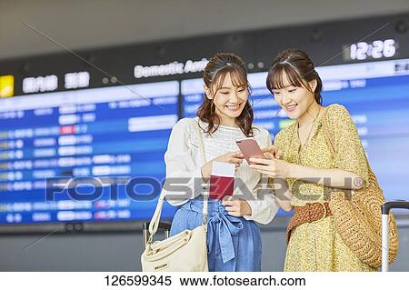 Japanese women at the airport View Large Photo Image Stock Photography - Japanese women at the airport. Fotosearch