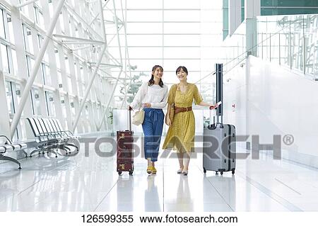 Japanese women at the airport View Large Photo Image Stock Photography - Japanese women at the airport. Fotosearch
