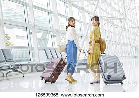 Japanese women at the airport View Large Photo Image Stock Photography - Japanese women at the airport. Fotosearch