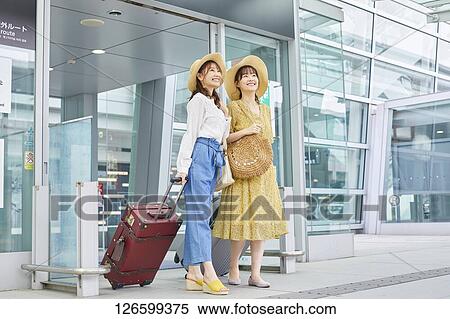 Japanese women at the airport View Large Photo Image Stock Photography - Japanese women at the airport. Fotosearch