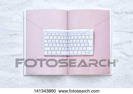 Stock Image - Keyboard Printed In Book. Fotosearch