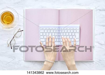 Stock Image - Keyboard Printed In Book. Fotosearch