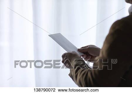 Man Holding Letter View Large Photo Image Stock Image - Man Holding Letter. Fotosearch