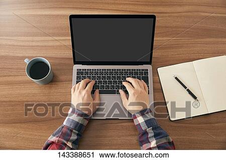 Man using laptop View Large Photo Image Stock Image - Man using laptop. Fotosearch