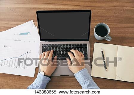 Man using laptop View Large Photo Image Stock Photography - Man using laptop. Fotosearch