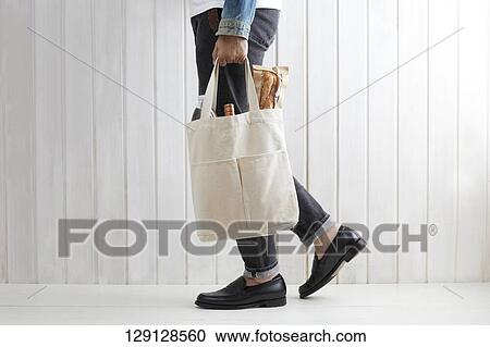 Man With Shopping Bag View Large Photo Image Stock Image - Man With Shopping Bag. Fotosearch