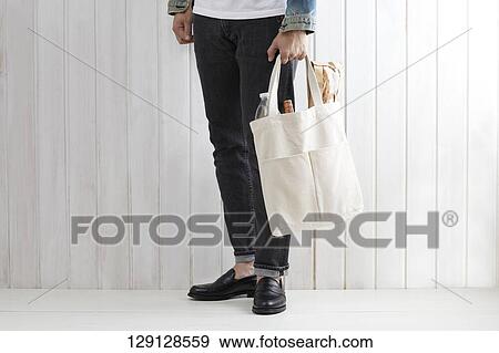 Stock Photo - Man With Shopping Bag. Fotosearch