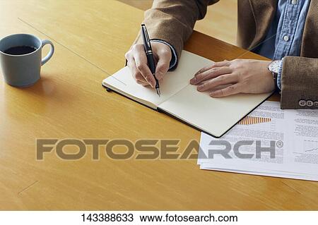 Man writing on paper View Large Photo Image Stock Image - Man writing on paper. Fotosearch
