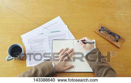Man writing on paper View Large Photo Image Stock Image - Man writing on paper. Fotosearch