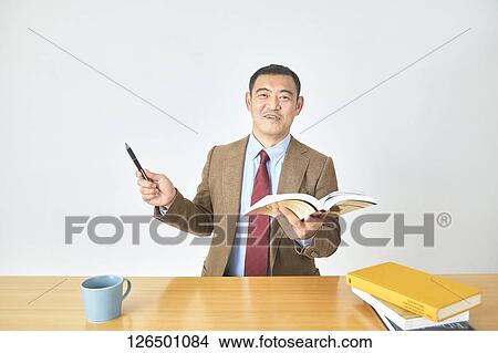 Picture - Mature Japanese businessman. Fotosearch