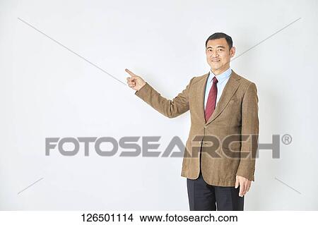 Picture - Mature Japanese businessman. Fotosearch