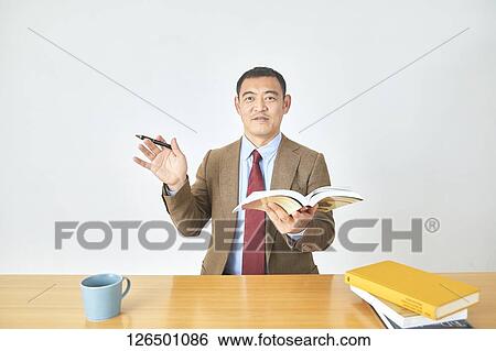 Stock Photograph - Mature Japanese businessman. Fotosearch