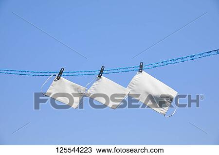 Medical masks drying in the sun View Large Photo Image Stock Image - Medical masks drying in the sun. Fotosearch