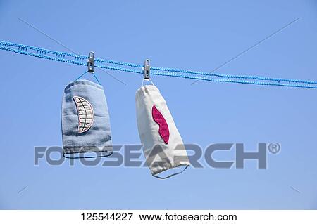 Medical masks drying in the sun View Large Photo Image Stock Photo - Medical masks drying in the sun. Fotosearch
