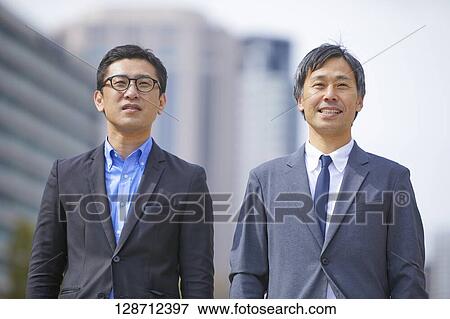 Stock Photo - Middle Aged Japanese Businessmen Portrait. Fotosearch