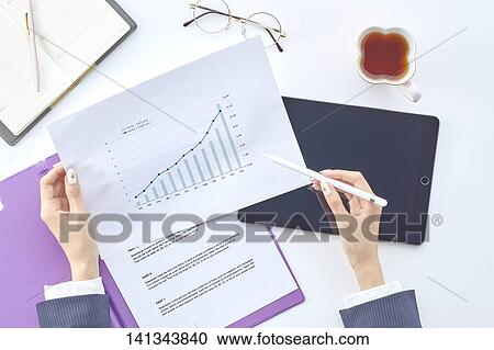 Stock Image - Paper Work With A Tablet PC. Fotosearch