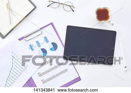 Stock Image - Paper Work With A Tablet PC. Fotosearch