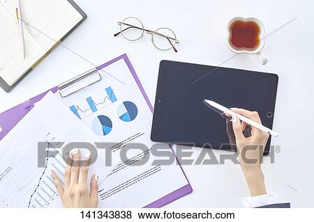 Stock Photo - Paper Work With A Tablet PC. Fotosearch