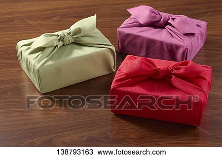 Stock Image - Parcel Wrapped In Japanese Wrapping Cloth. Fotosearch
