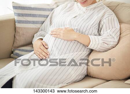 Pregnant Japanese woman View Large Photo Image Stock Image - Pregnant Japanese woman. Fotosearch