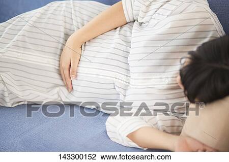 Pregnant Japanese woman View Large Photo Image Stock Image - Pregnant Japanese woman. Fotosearch