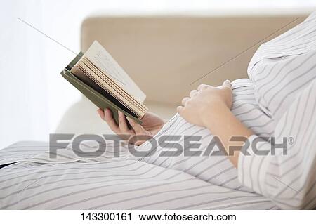 Pregnant Japanese woman View Large Photo Image Stock Image - Pregnant Japanese woman. Fotosearch