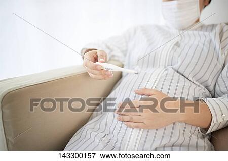 Stock Photo - Pregnant Japanese woman. Fotosearch