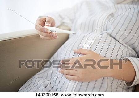 Stock Photo - Pregnant Japanese woman. Fotosearch