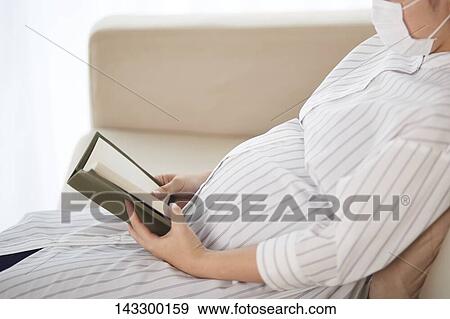 Stock Photo - Pregnant Japanese woman. Fotosearch
